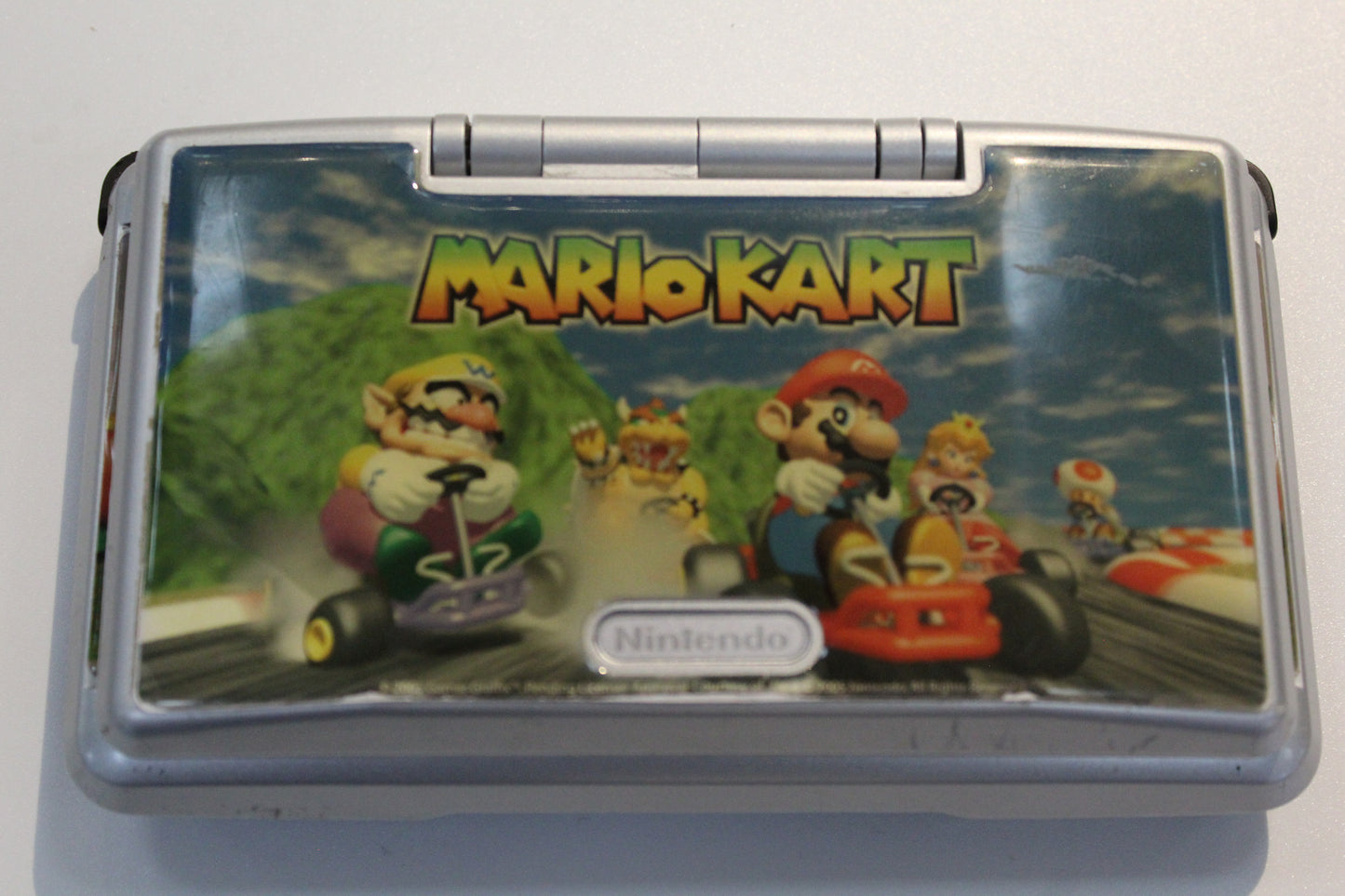 Nintendo DS Handheld with Mario Kart Stickers (tested)