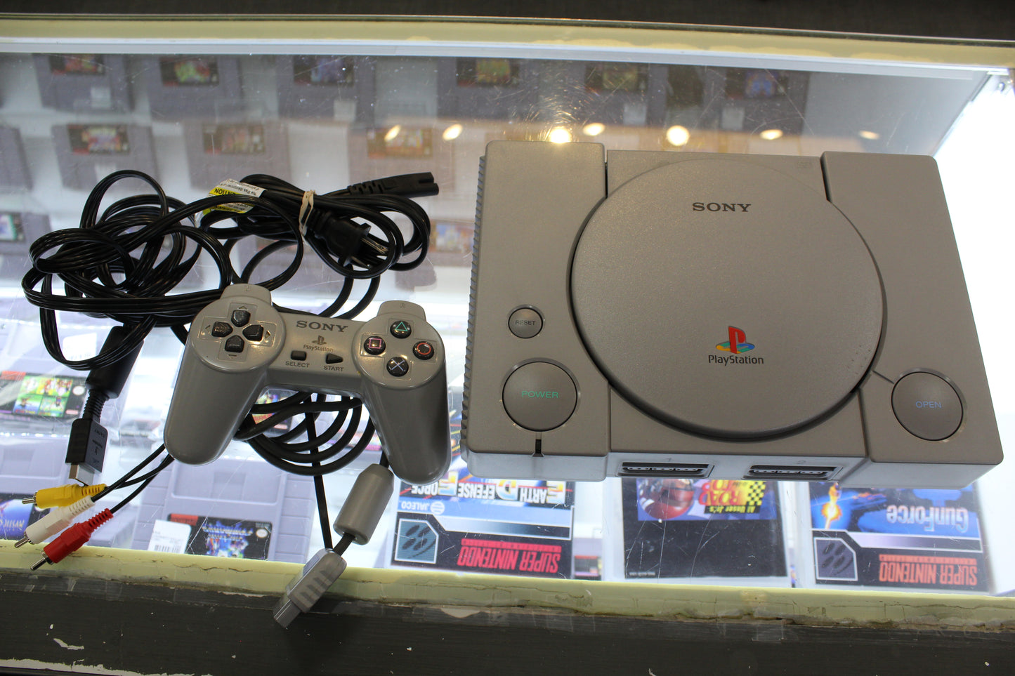 PlayStation One Console with controller